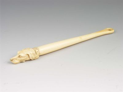 Appraisal: A th century carved ivory hare coursing stick with a