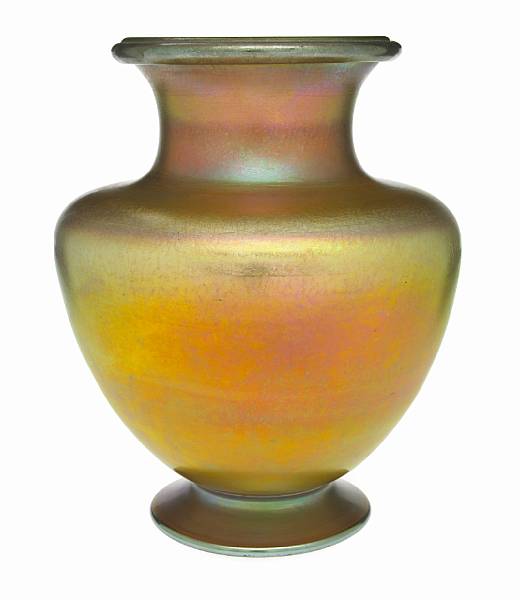 Appraisal: A Tiffany Favrile glass urn form footed vase circa inscribed