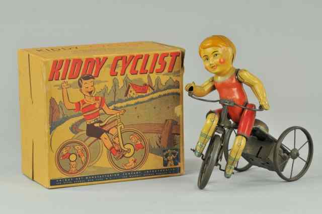 Appraisal: UNIQUE ART KIDDY CYCLIST IN ORIGINAL BOX Litho tin wind-up