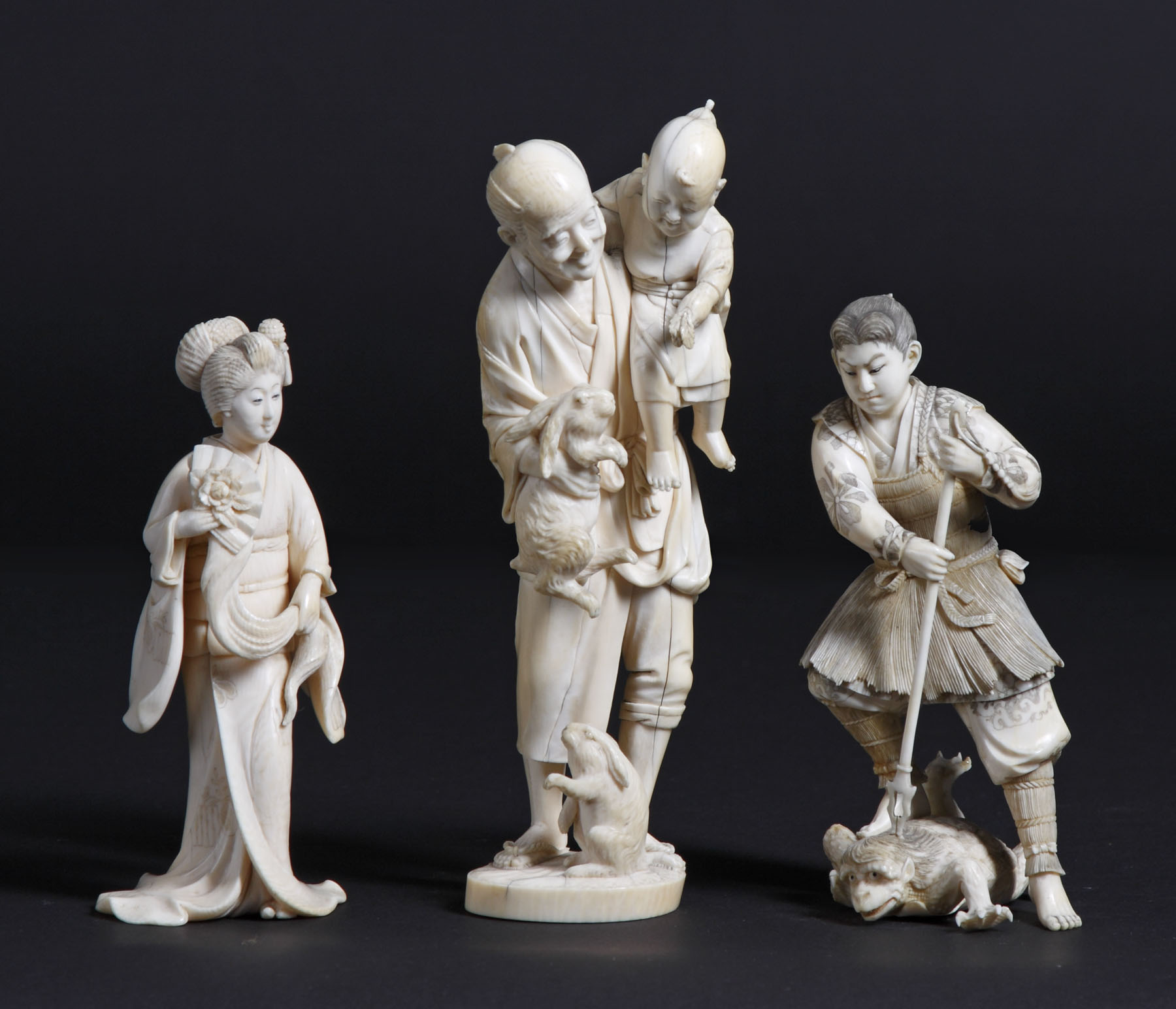 Appraisal: Carved Ivory Figures - L R L Woman w carved