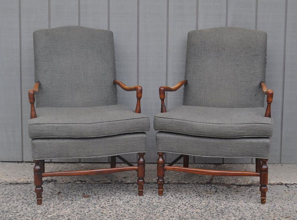 Appraisal: Pair French Upholstered Open Armchairs on turned front legs Use