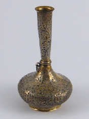 Appraisal: An eastern white metal tests silver vase with tall stem