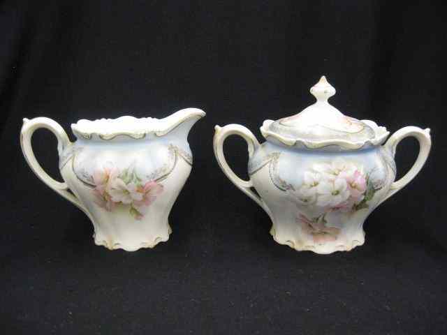 Appraisal: R S Prussia Porcelain Creamer Sugar floral with gold trim