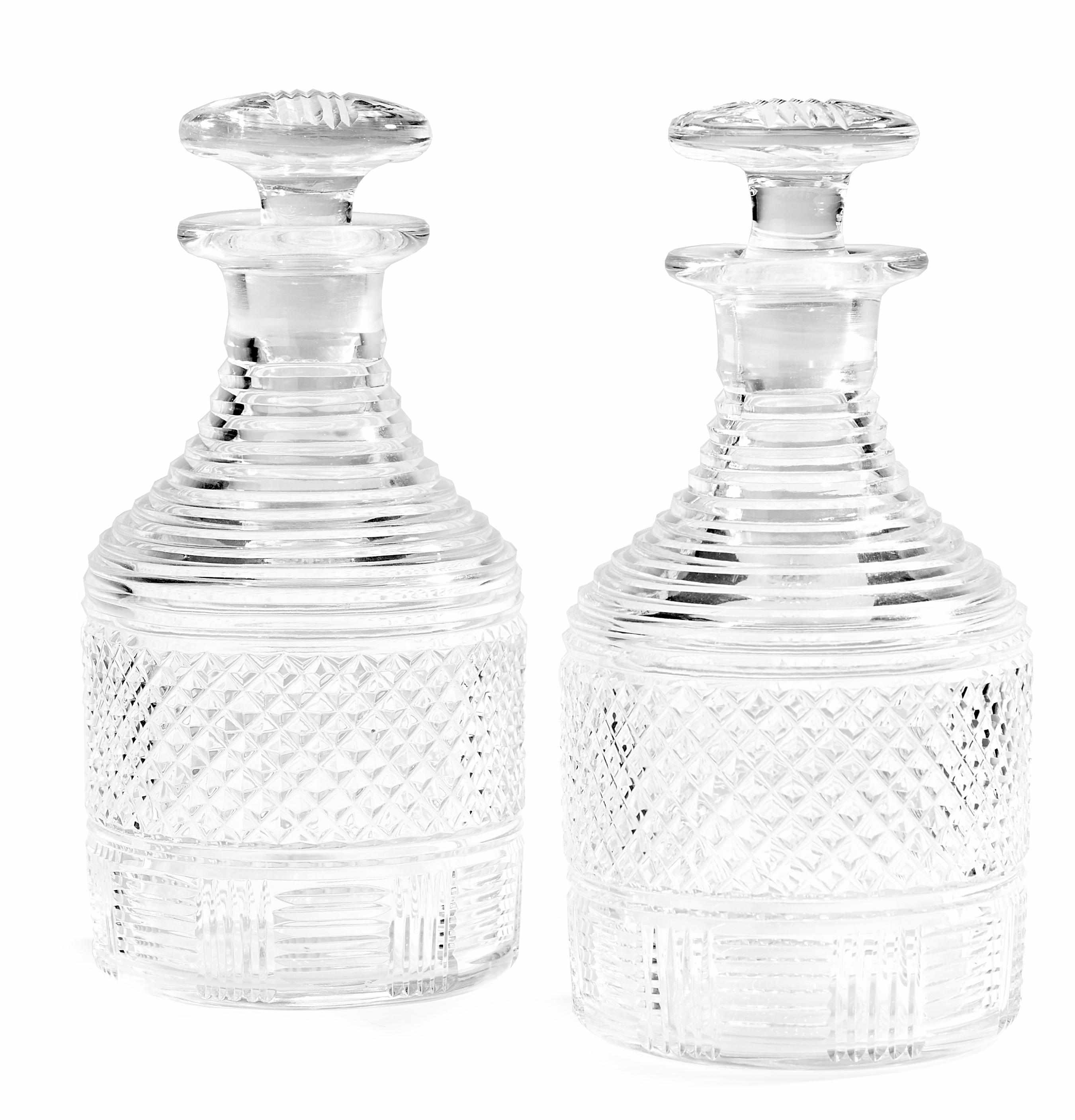 Appraisal: A pair of Regency style cut glass decanters and stoppers