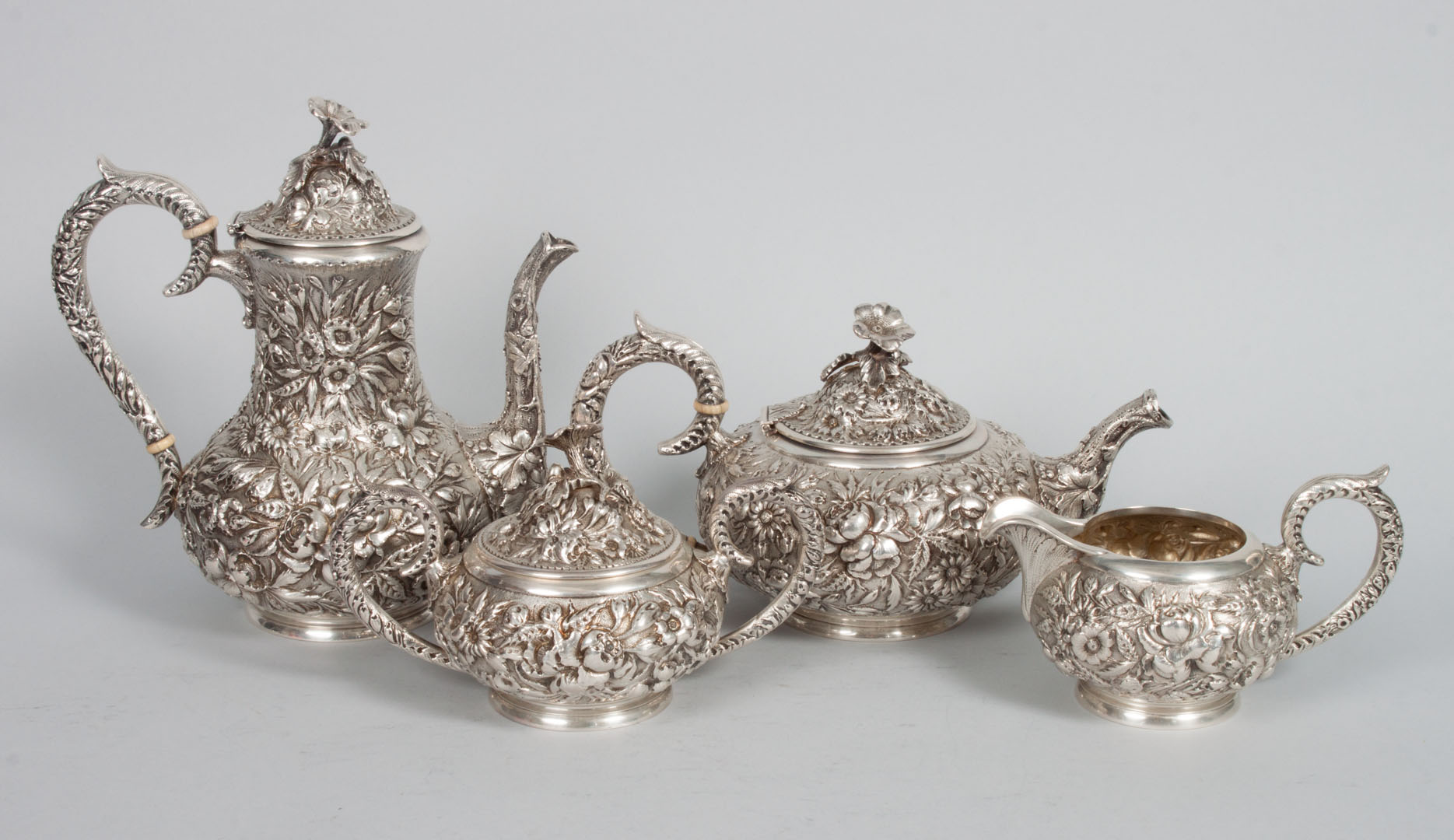 Appraisal: American repousse sterling silver coffee tea set Baltimore Sterling Silver