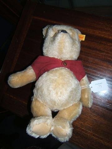 Appraisal: Steiff mohair Winnie the Pooh teddy bear in red suede