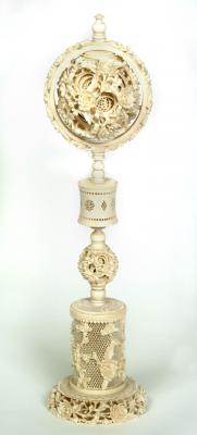 Appraisal: A CHINESE CARVED IVORY PUZZLE BALL ON STAND c the