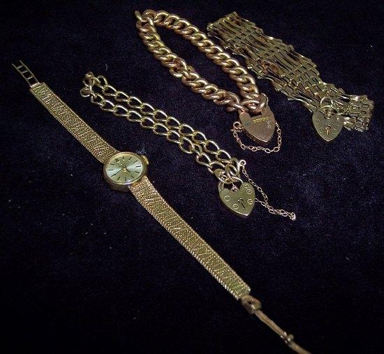 Appraisal: A ct gold gate link bracelet with padlock clasp two