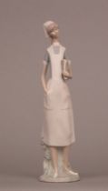 Appraisal: Lladro Nurse Graceful porcelain figure of a young nurse This