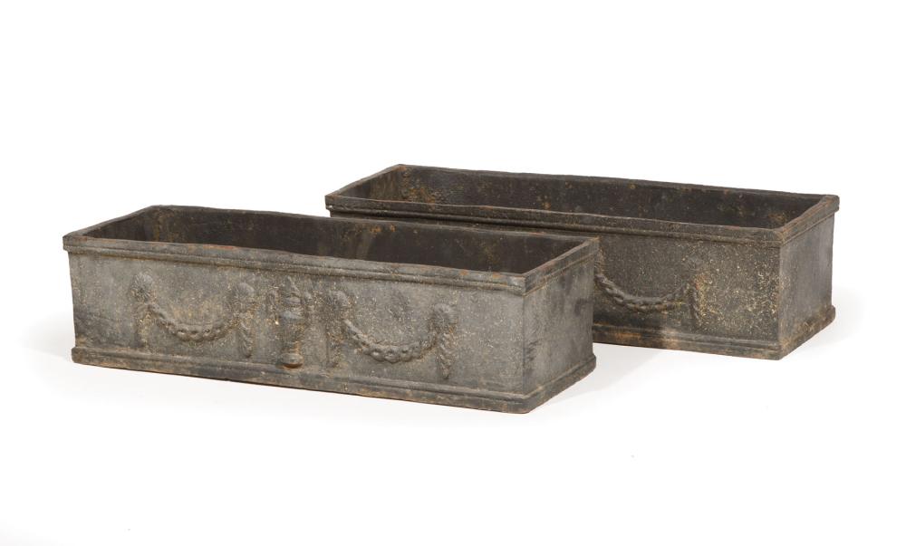 Appraisal: Pair of Cast Iron Planter Boxes central urn interlaced swag