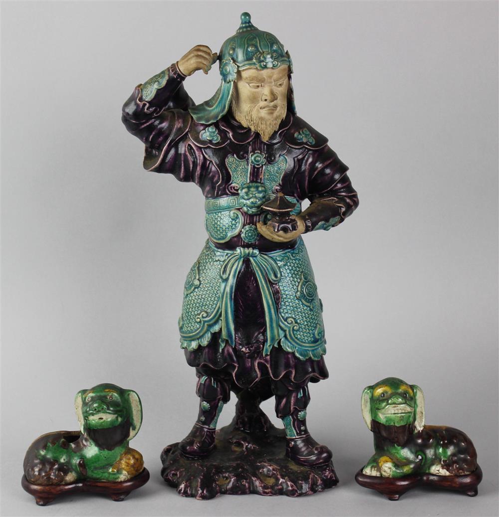 Appraisal: A CHINESE FAHUA FIGURE OF A WARRIOR the bearded soldier