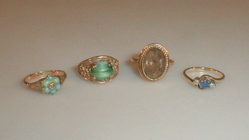 Appraisal: Four ct gold stone set dress rings various styles