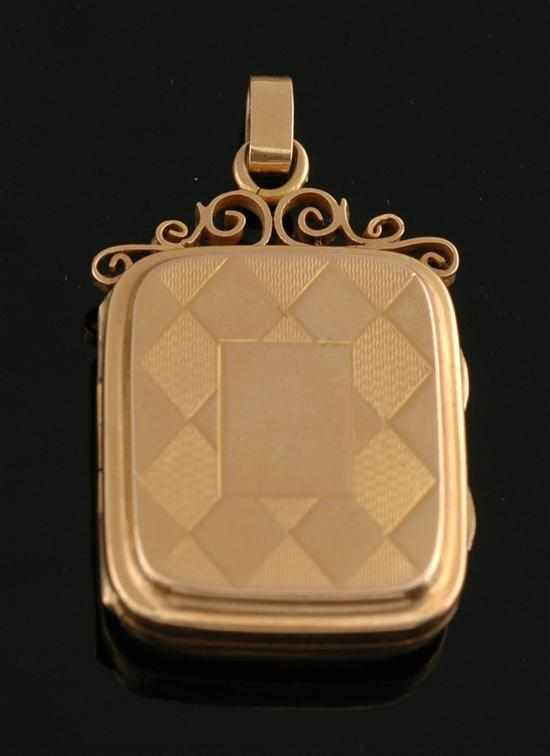 Appraisal: An early Victorian gold locket The rectangular locket with engraved