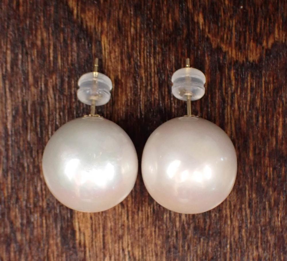 Appraisal: PAIR OF SOUTH SEA PEARL AND EIGHTEEN KARAT GOLD EAR