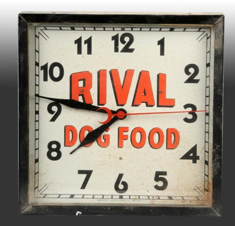 Appraisal: Rival Dog Food Electric Clock Description Circa Rust stains to