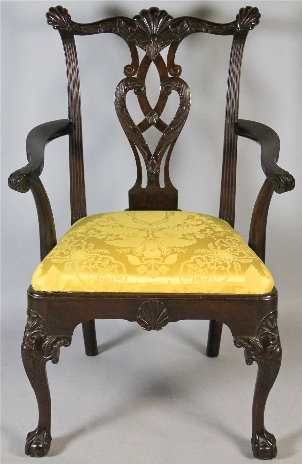 Appraisal: CHIPPENDALE STYLE CARVED MAHOGANY ARM CHAIR having a shell carved