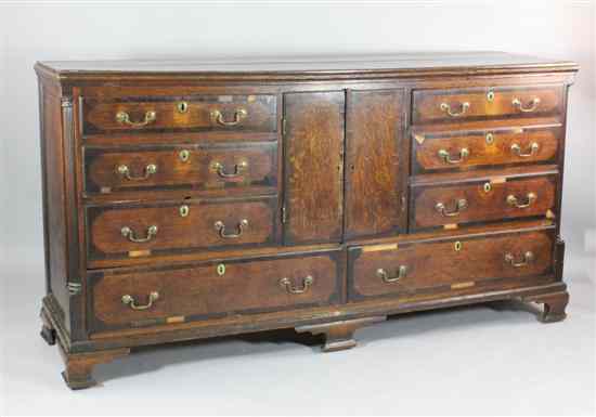 Appraisal: A George III oak and mahogany crossbanded dresser base with