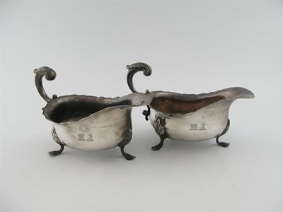 Appraisal: A pair of George IV silver sauceboats by D J