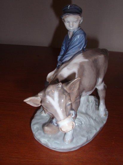 Appraisal: A Royal Copenhagen figure Boy with Calf no cm high