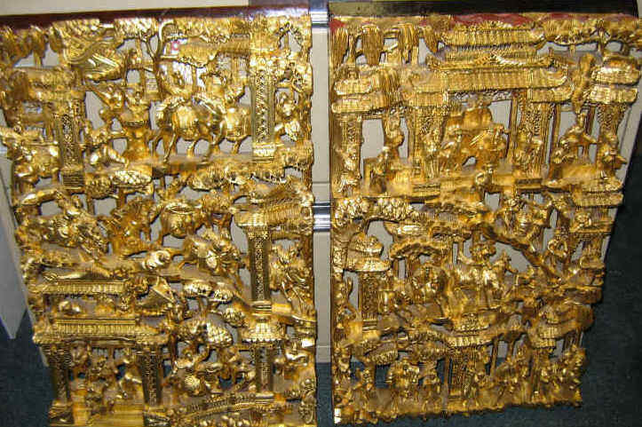 Appraisal: PAIR OF CHINESE ELABORATE TEMPLE CARVINGS Rectangular wooden panels carved