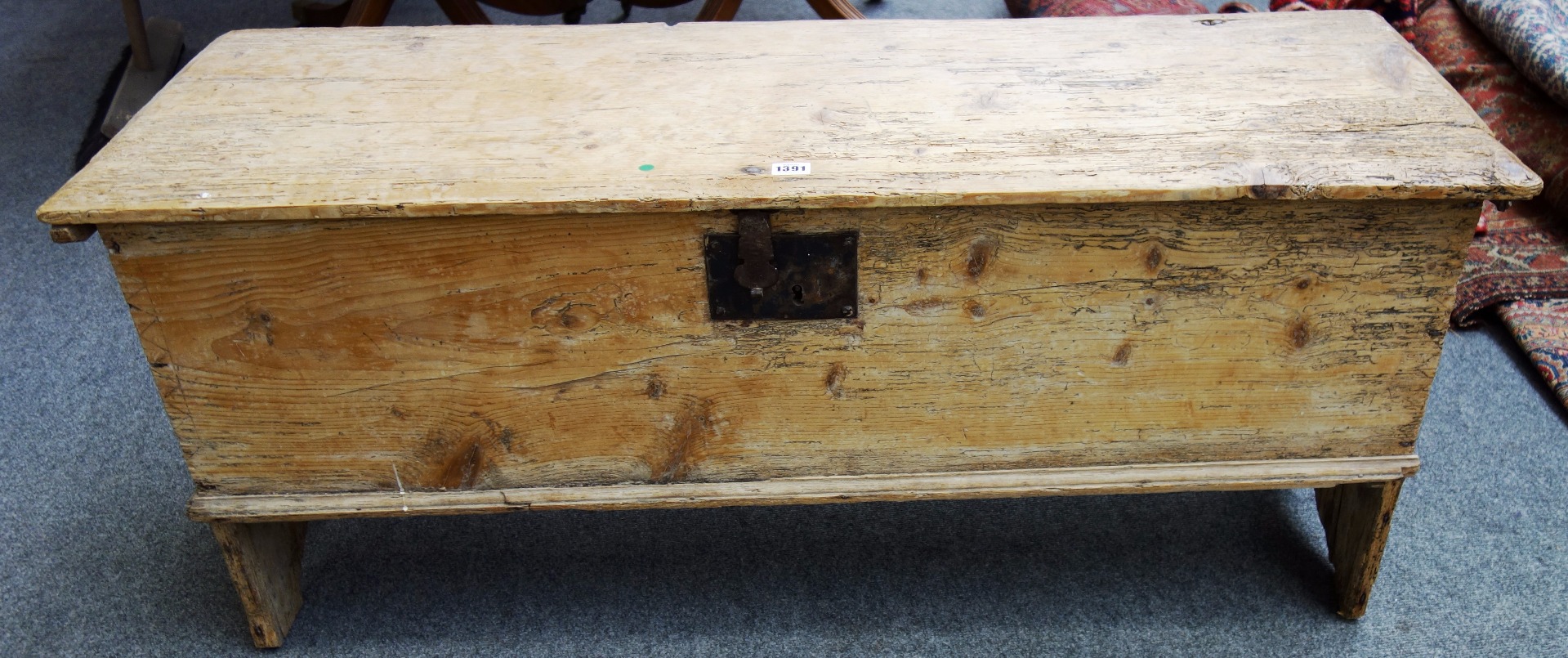 Appraisal: An th century pine five plank coffer on slab end