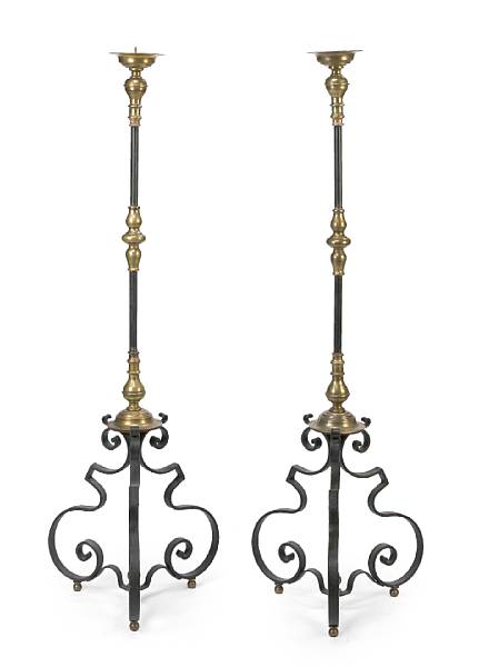 Appraisal: A pair of Spanish Baroque style brass and wrought iron