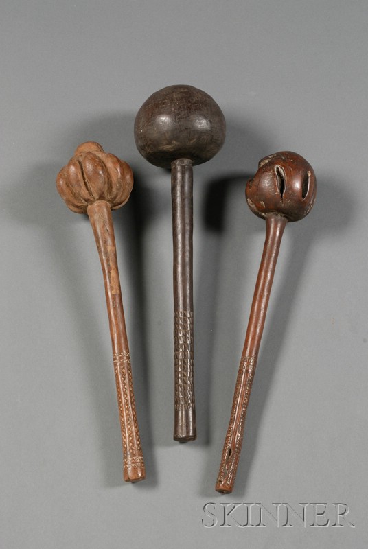 Appraisal: Three Polynesian Carved Wood Throwing Clubs one with a spherical