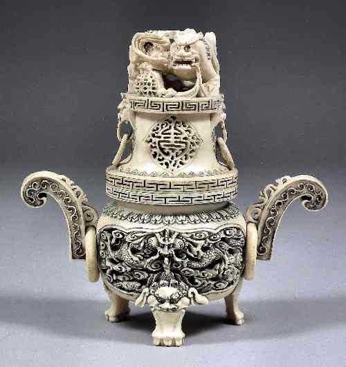 Appraisal: A Chinese ivory two-handled censer and cover carved with dragons