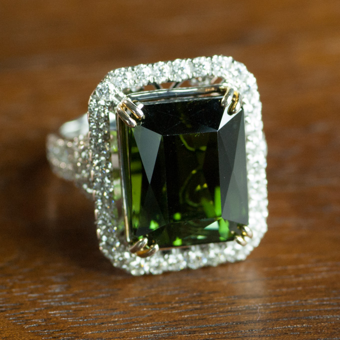 Appraisal: GREEN TOURMALINE AND DIAMOND RING The k white gold ring