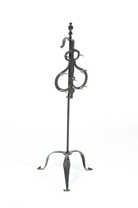 Appraisal: WROUGHT IRON STANDING HANGER American th century Adjustable heart shape