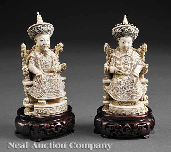 Appraisal: A Pair of Chinese Carved and Tinted Ivory Emperor and