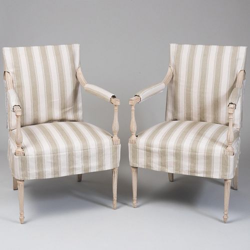 Appraisal: PAIR OF GEORGE III PAINTED ARMCHAIRS AFTER A DESIGN BY