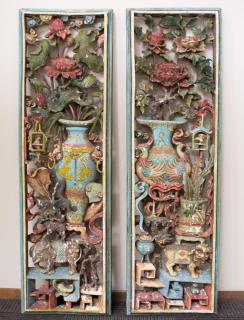 Appraisal: Chinese Carved Polychrome Wood Panels Pair Chinese hand-carved and painted