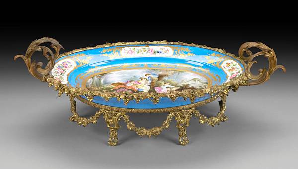 Appraisal: A S vres style gilt metal mounted porcelain centerpiece bowl