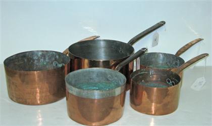 Appraisal: Five assorted sized copper sauce pans with cast iron handles