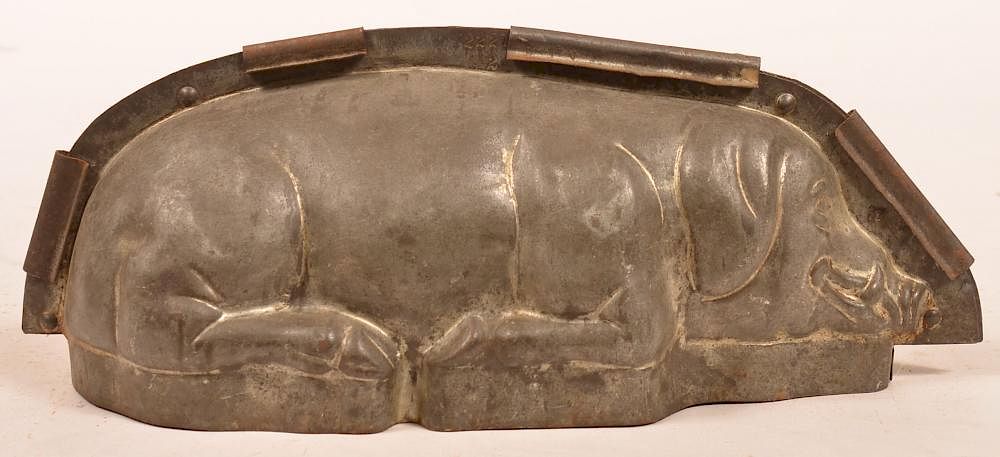 Appraisal: Antique Tin Reclining Pig Form Chocolate Mold Antique Tin Reclining