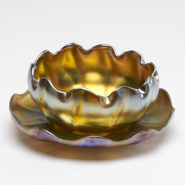 Appraisal: TIFFANY Favrile glass bowl and underplate each marked LCT Favrile