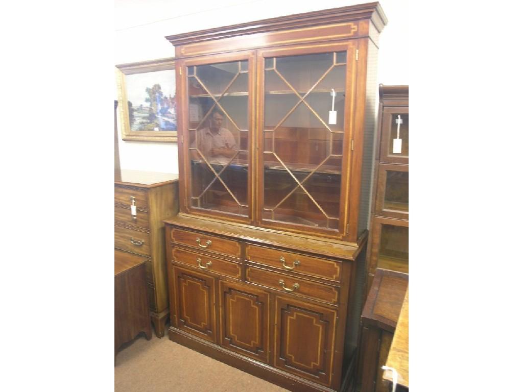 Appraisal: A Georgian-style inlaid mahogany bookcase upper stage with three adjustable