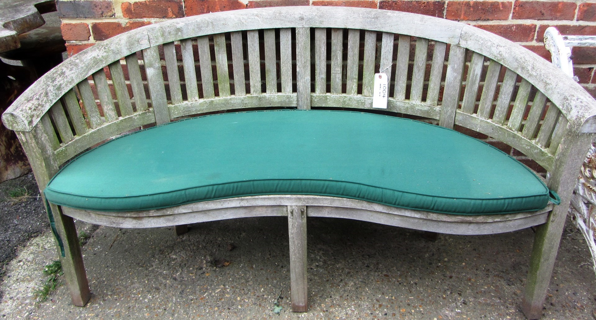 Appraisal: A th century hardwood curved garden bench with cushion cm