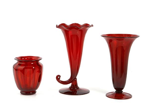 Appraisal: A Steuben Selenium Red optic rib vase shape number together