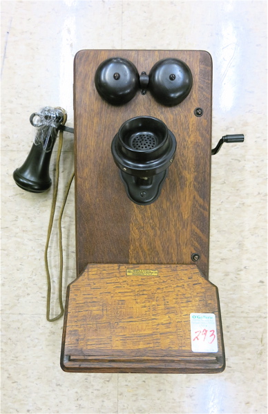 Appraisal: AN ANTIQUE OAK WALL TELEPHONE Kellogg Switchboard Supply Co Chicago