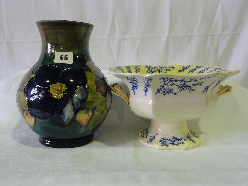 Appraisal: A large Moorcroft green ground vase with purple and blue