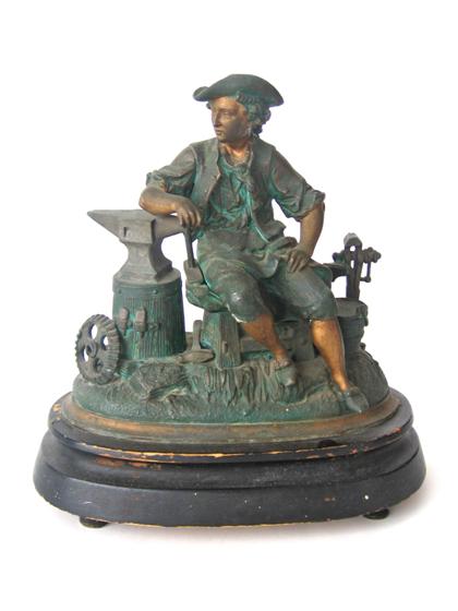 Appraisal: Patinated and polychrome spelter figure of an th century blacksmith