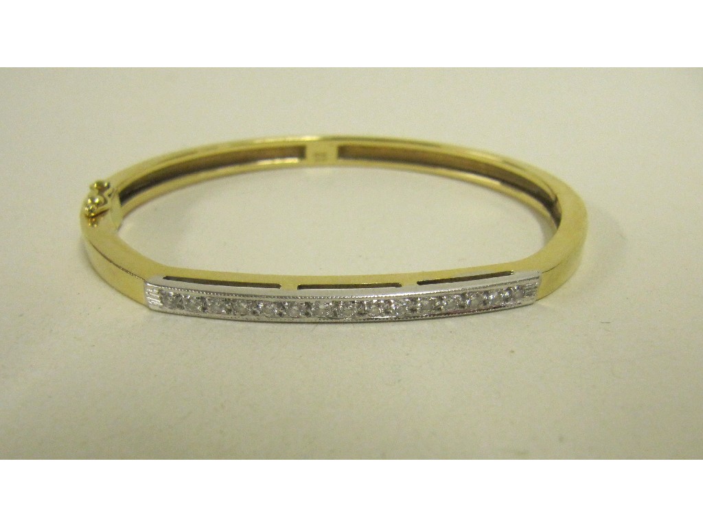 Appraisal: Eighteen carat gold diamond set bangle