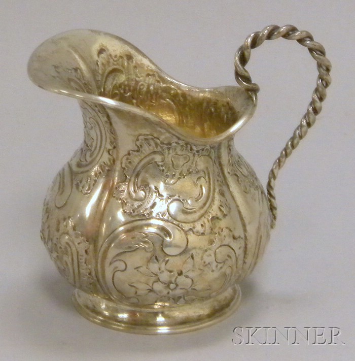 Appraisal: Continental Silver Creamer chased and embossed with rocaille C-scrolls