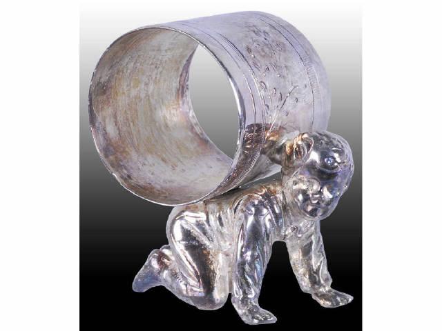 Appraisal: Crawling Boy Carries Figural Napkin Ring Description Boy carries napkin