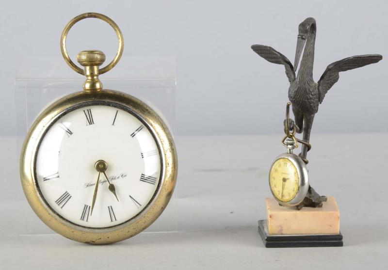 Appraisal: Lot Of Pocketwatch Items Including - figural crane standing on