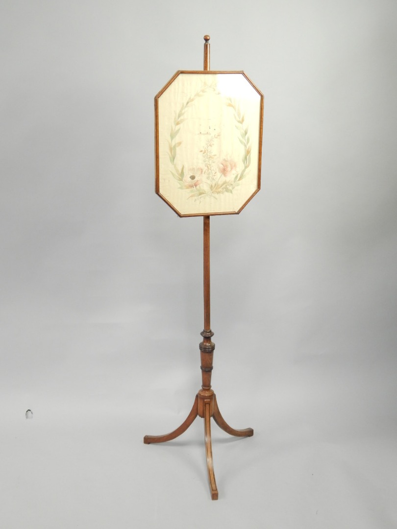 Appraisal: A Regency mahogany pole screen with turned pole holding canted