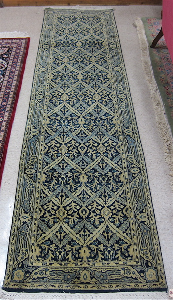 Appraisal: HAND KNOTTED ORIENTAL RUNNER Pakistani-Persian overall green foliate design on