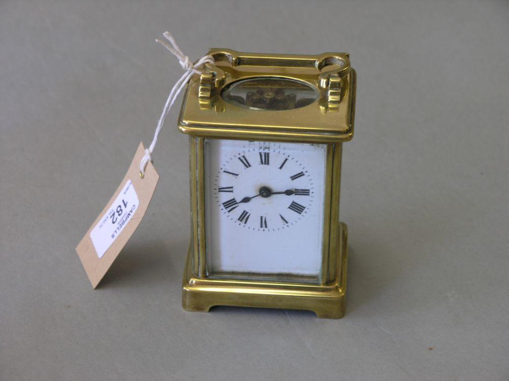 Appraisal: A late th early th century brass carriage clock with